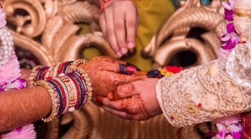 Indian Wedding hand holding