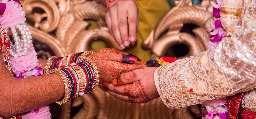 Indian Wedding hand holding